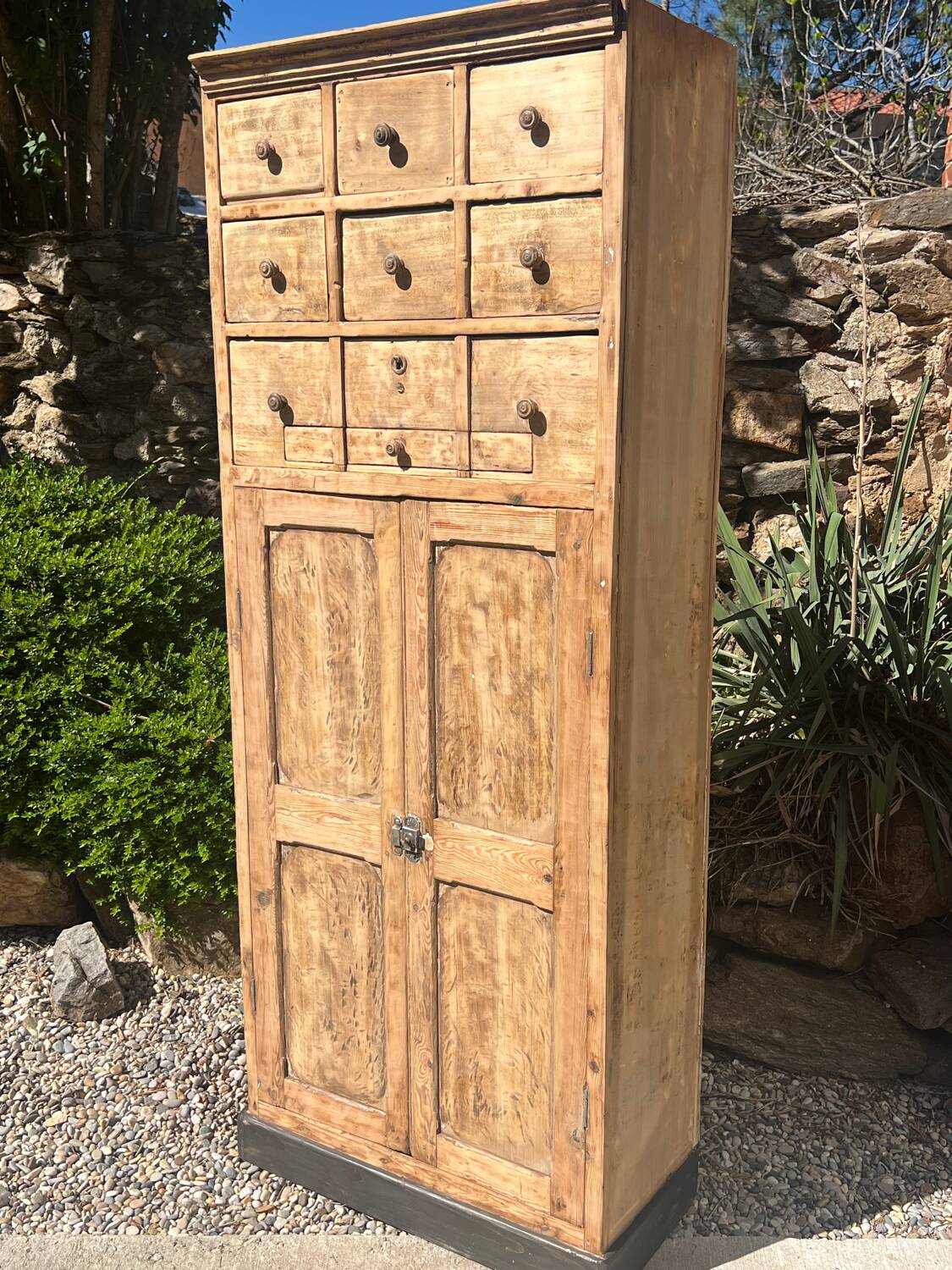 Beautiful piece of furniture with 8 drawers/2 doors in raw wood.