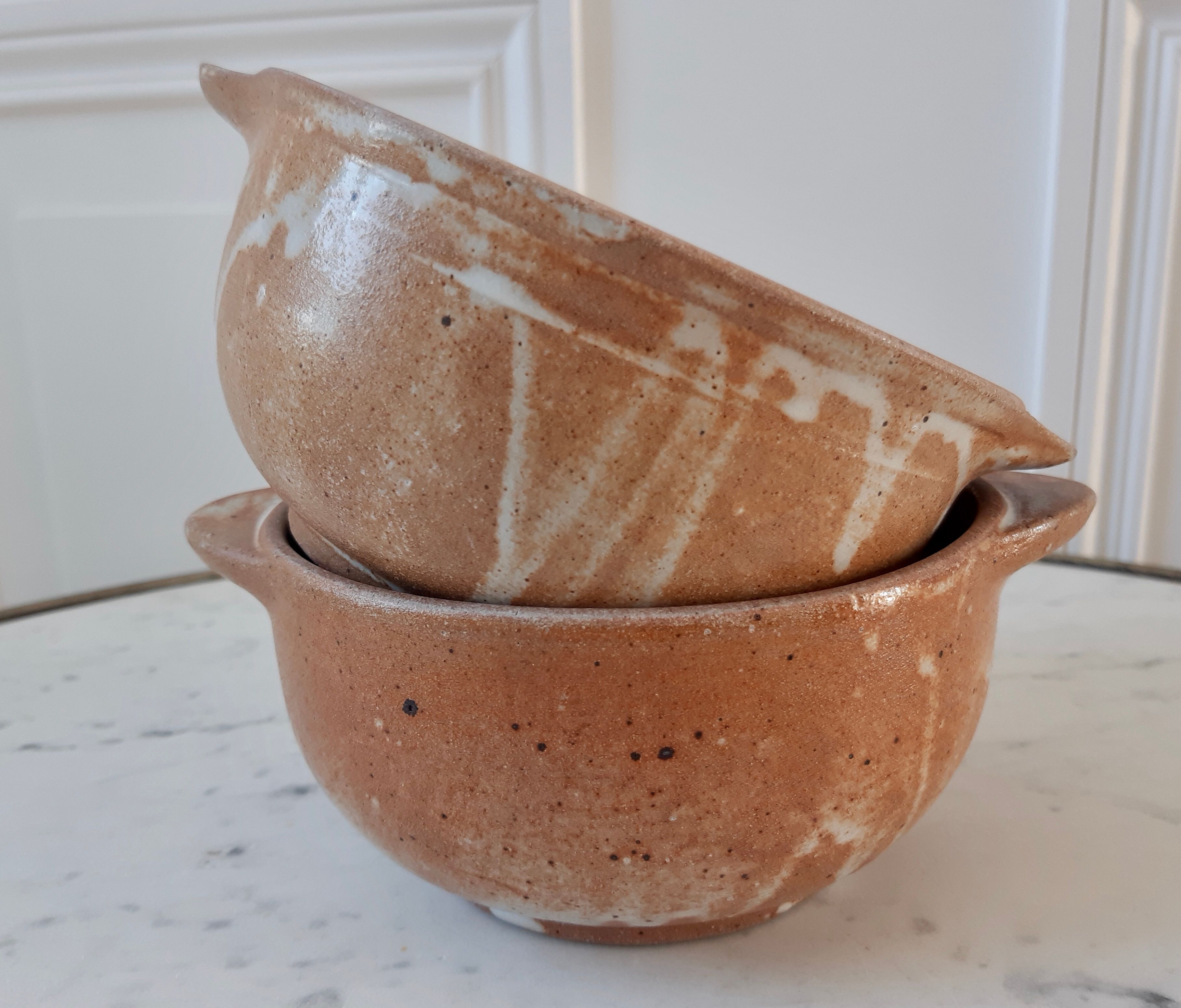 Duo of ear bowls in vintage sandstone