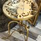 Pair of small side tables or end tables in gilded wrought iron, typical of the 1950s/1960s.