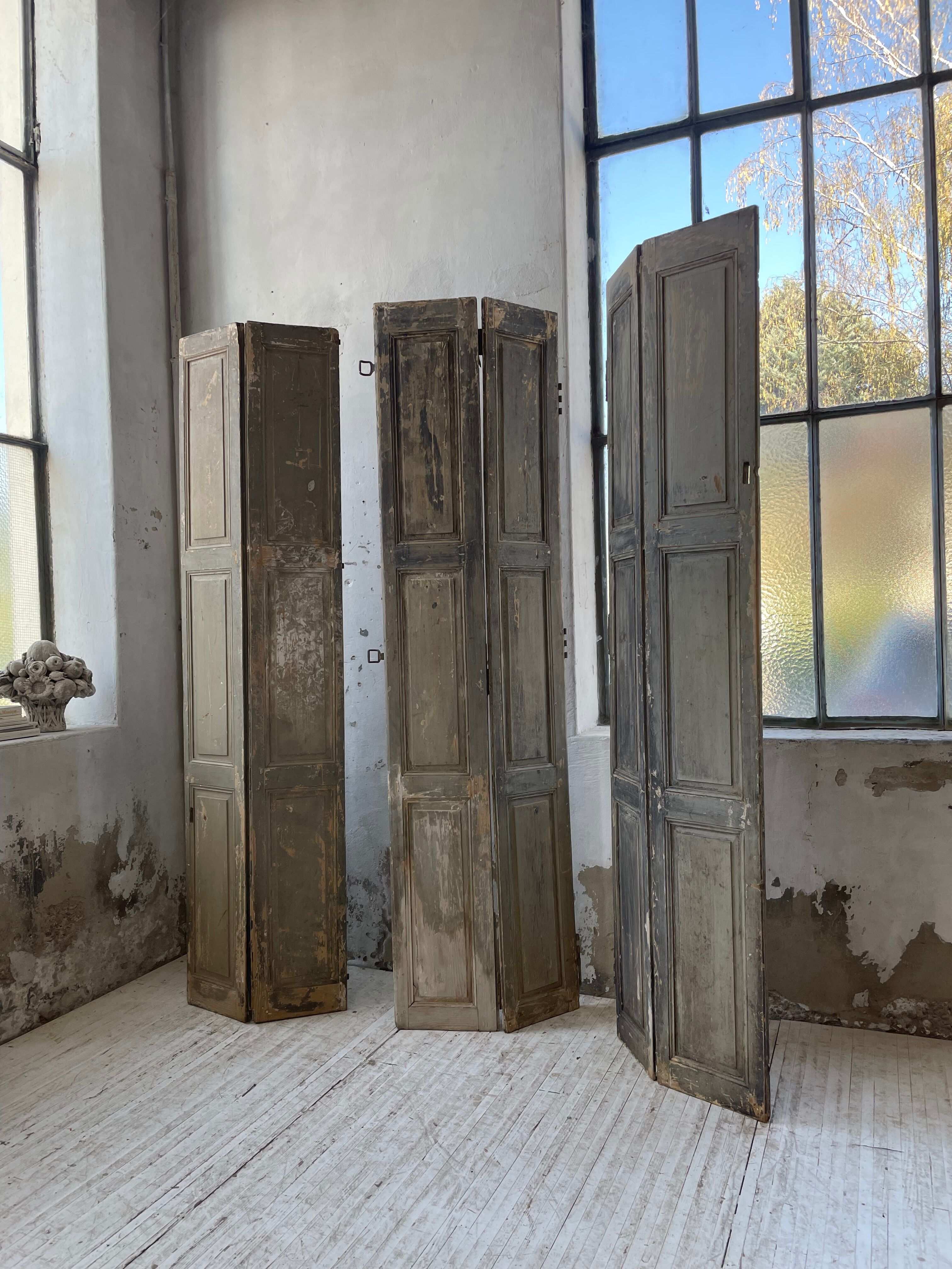 Trio of shutters louvers patina blue gray
