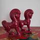 Pair of red porcelain horse bookends