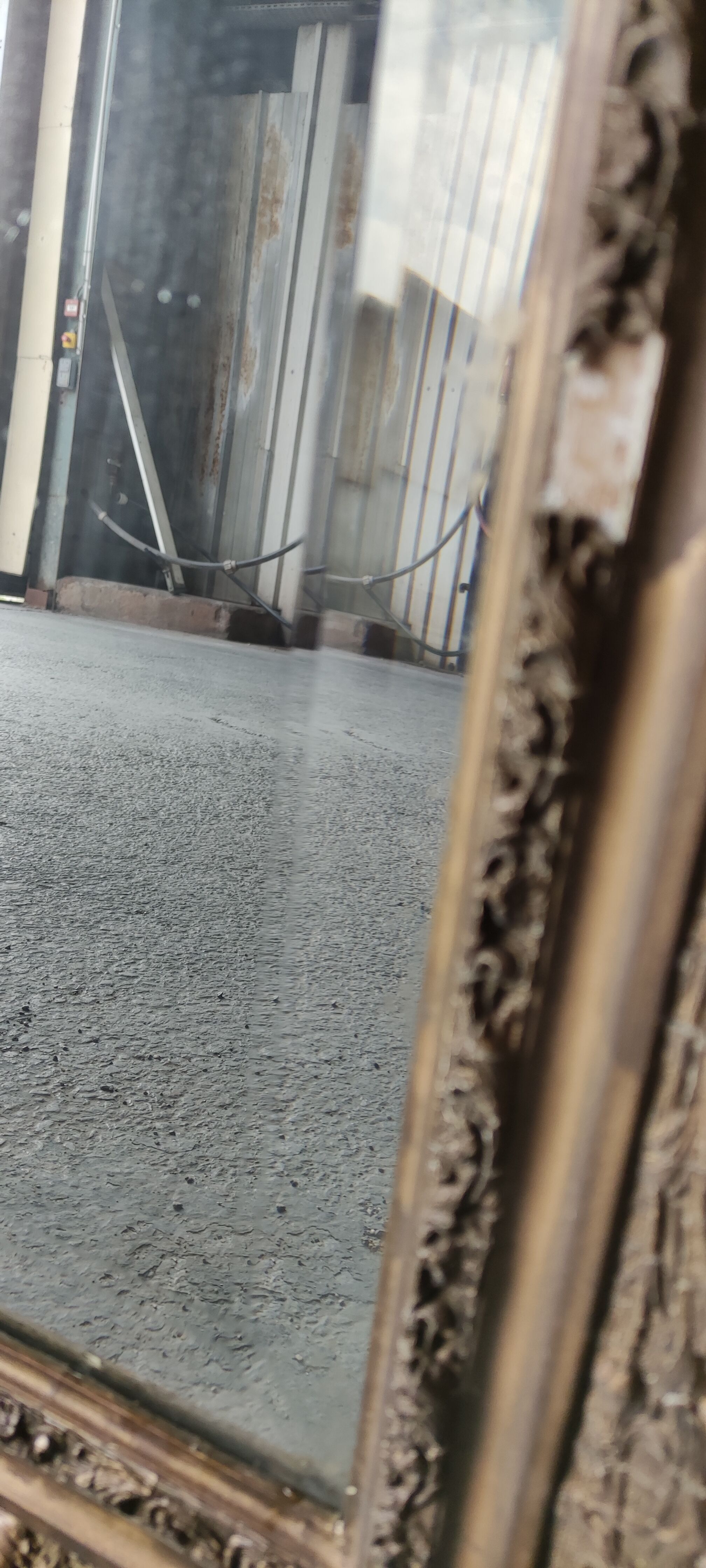 Old beveled mirror, faded castle decoration