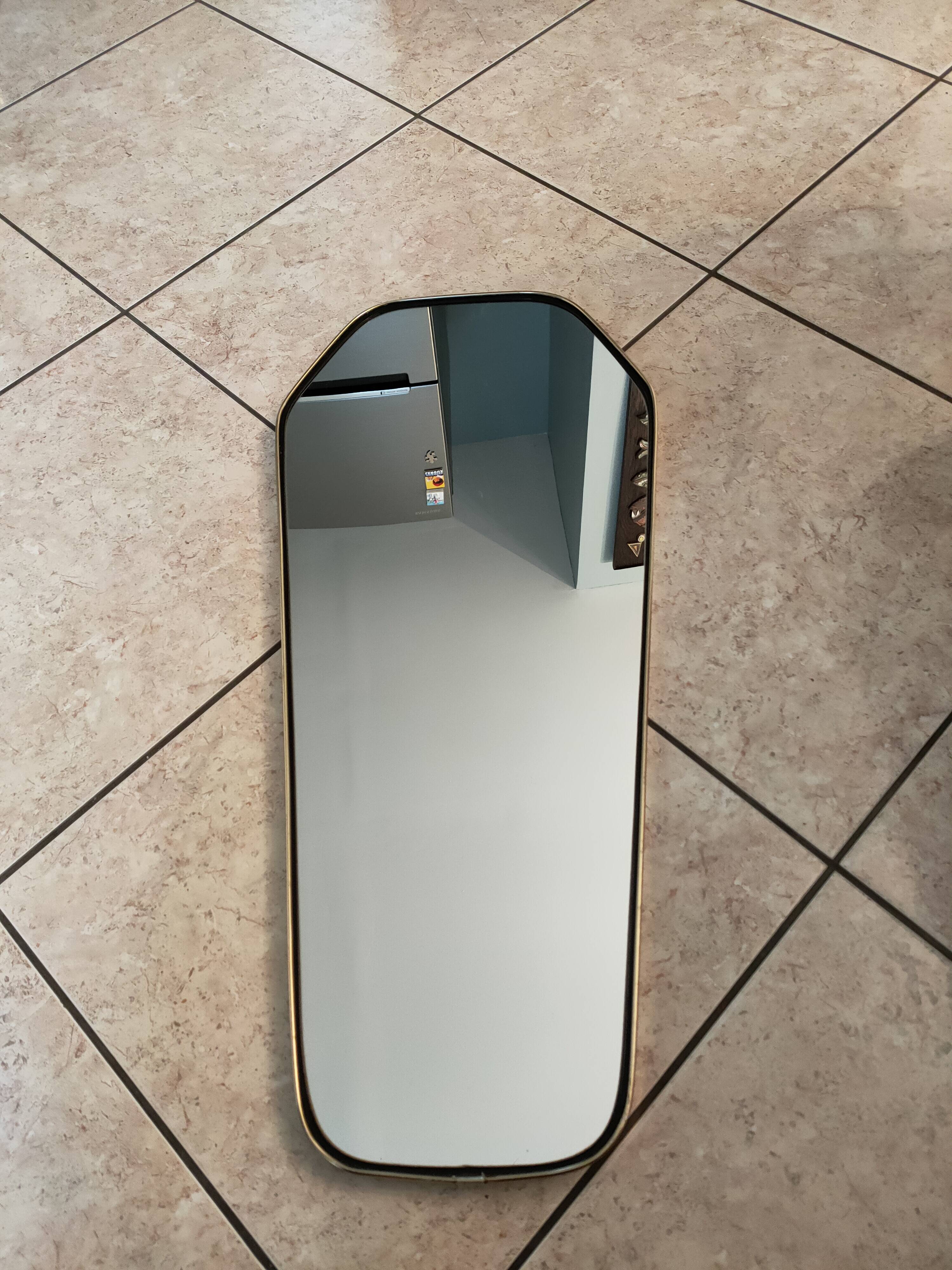 Free-form mirror from the 50s-60s