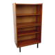 Vintage wooden bookshelf in teak style from the 1960s.