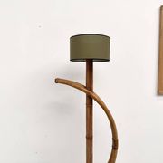 Sculptural floor lamp in bent rattan