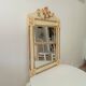 Vintage bohemian mirror from the 80s in carved wood.