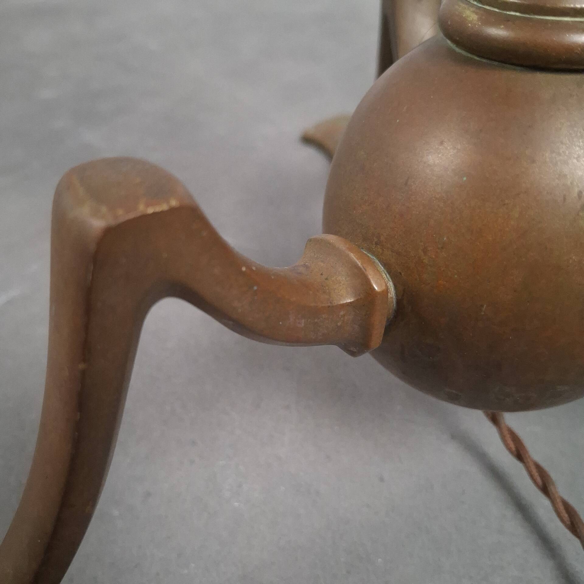 Art and Craft tripod floor lamp in bronze.