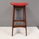 Bar stool, made of teak wood and cognac/red leather. Denmark 1960s