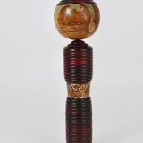 Decorative Kokeshi doll sculpture from northern Japan, hand-painted, signed.