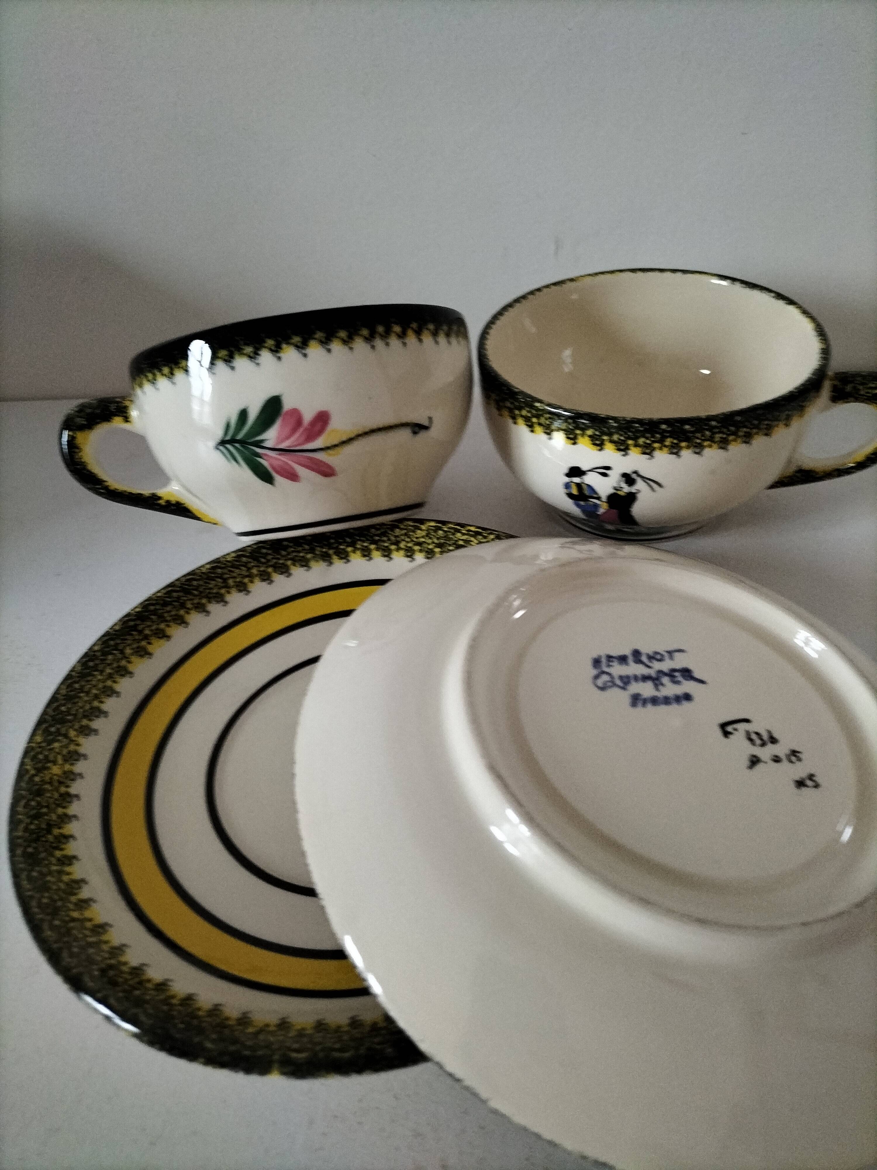 Two Henriot Quimper cups and saucers