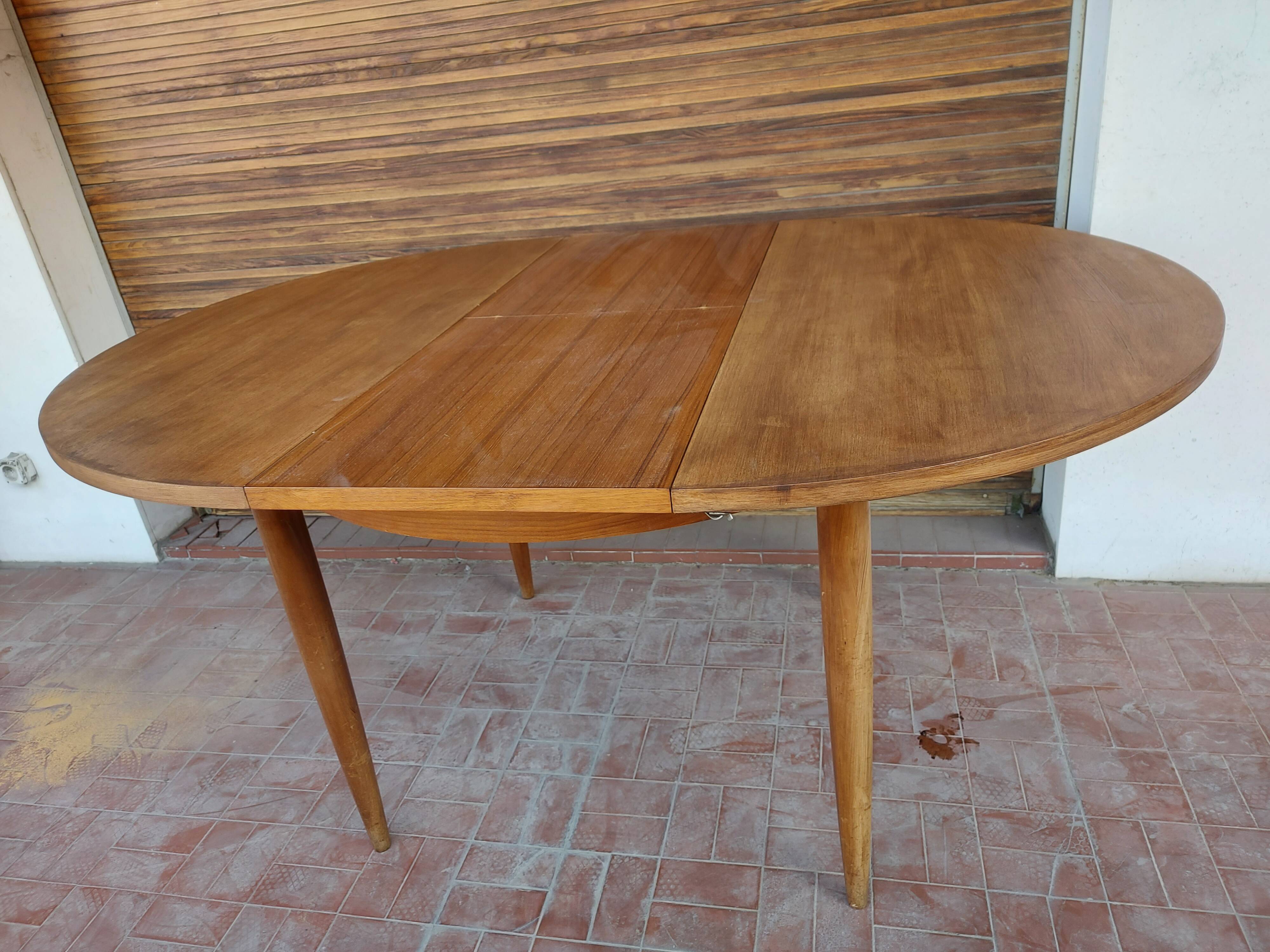 Scandinavian design teak table with extension cord