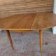 Scandinavian design teak table with extension cord