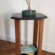 Art Deco console with sculpted black lacquered legs.