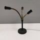 Old cast iron table lamp with brass bend and 3 light sources