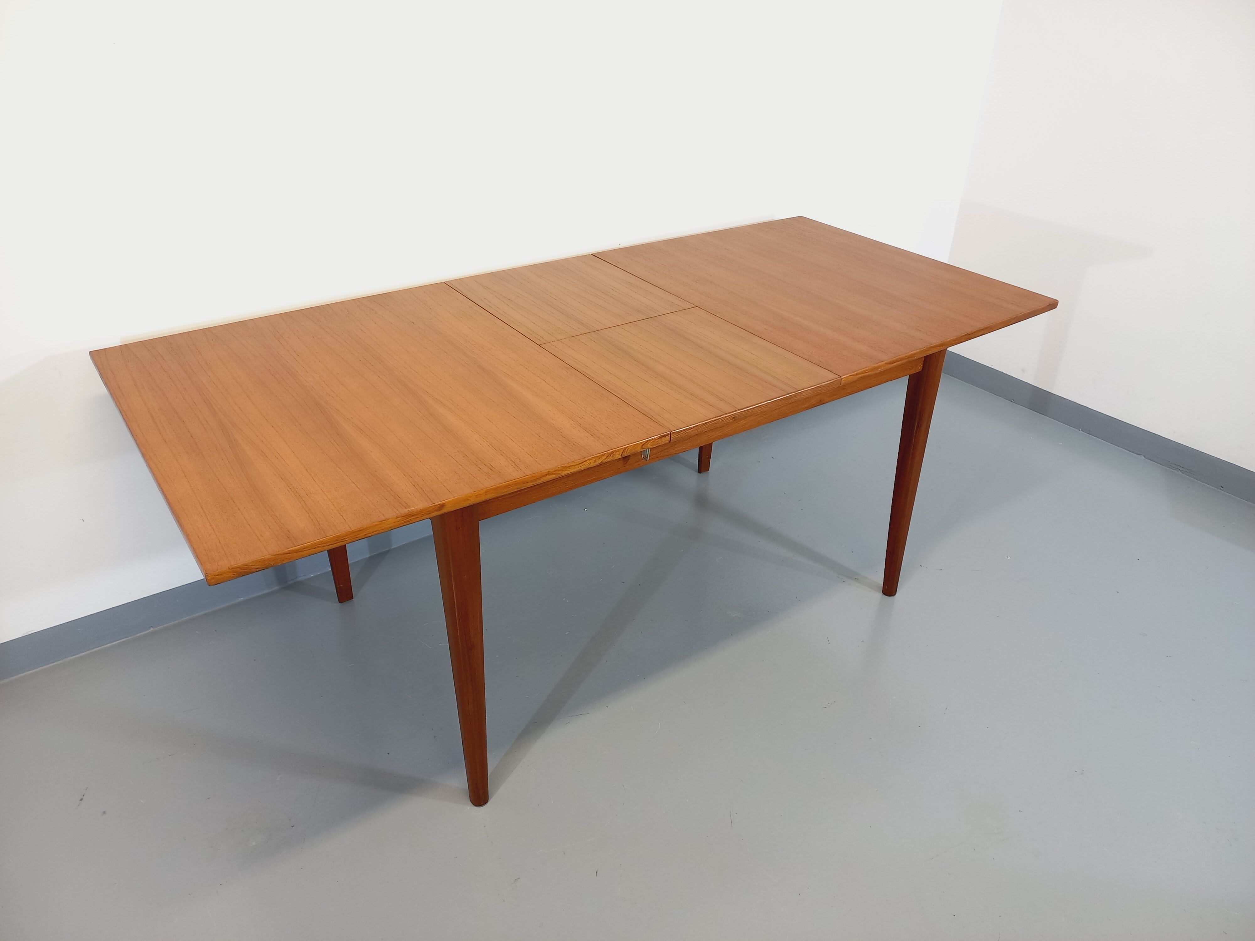 Vintage Scandinavian dining table from 50s 60s teak with extension