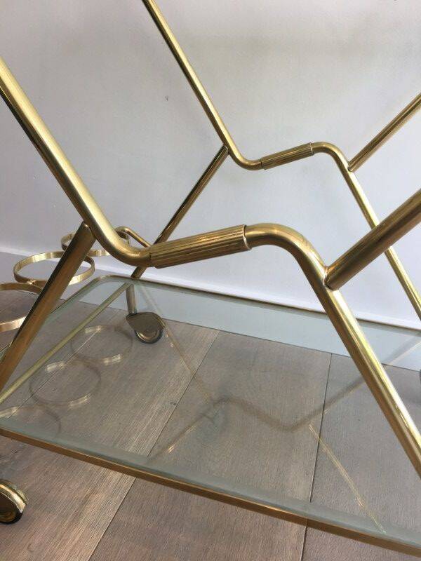 Italian designer rolling table in brass and engraved glass