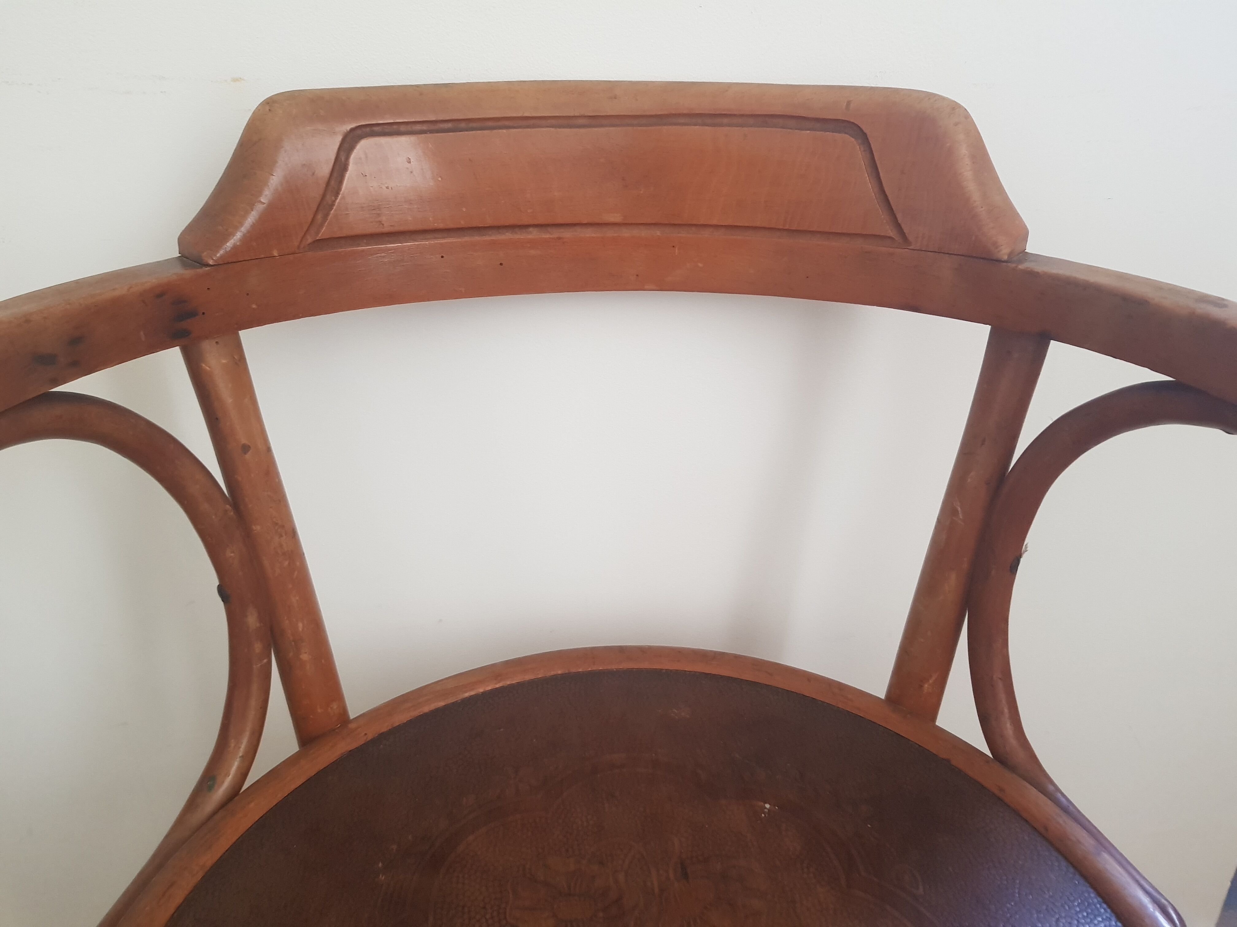 Wooden bistro chair with armrests