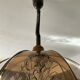 Scandinavian style glass and wood pendant light.