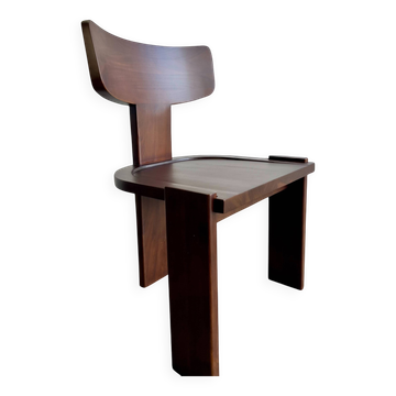 Retro brutalist chair in dark solid wood