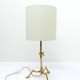 Articulated tripod lamp base in brass, Arts & Crafts style, in the manner of.