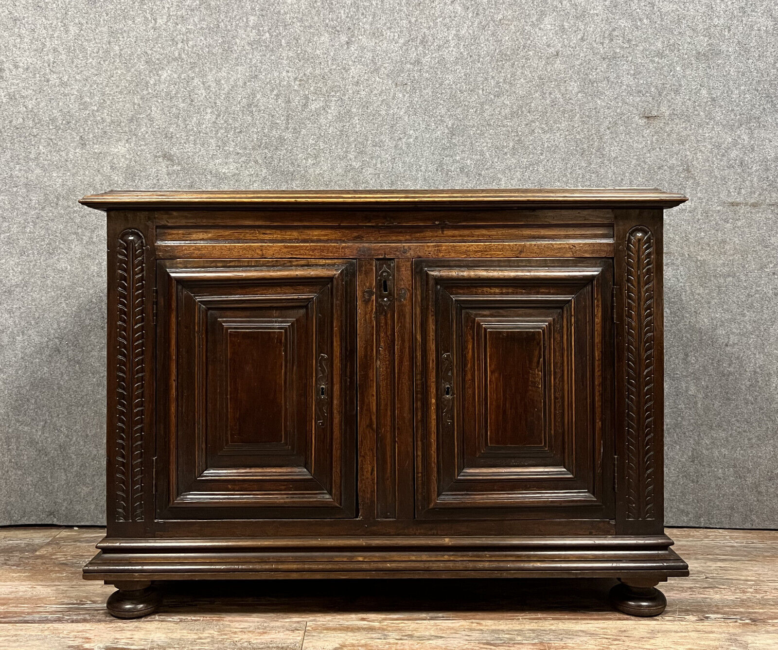 Sideboard has function as a Louis XIV period chest in solid walnut