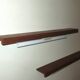 Pair of Danish teak shelves with wall lights, 1960s