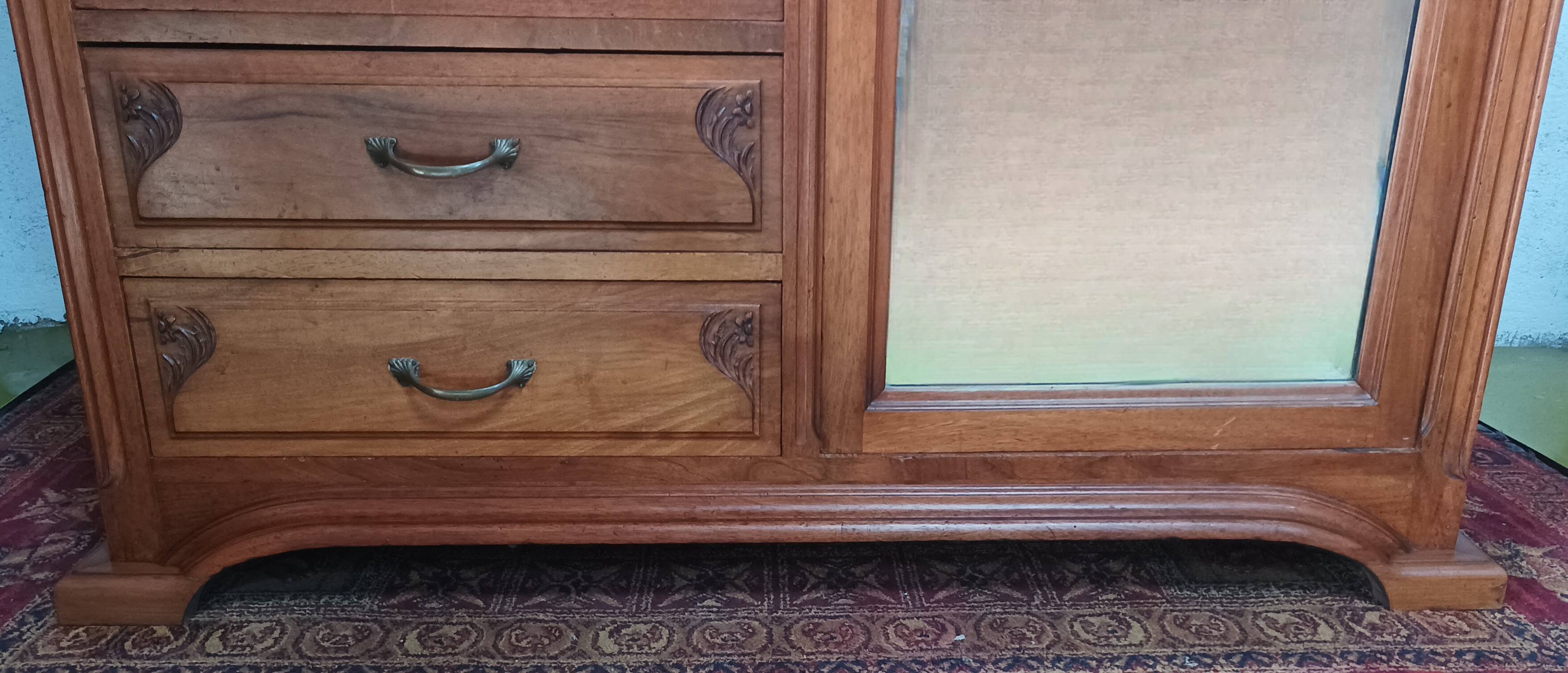 Art Nouveau carved walnut cabinet