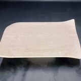 Travertine coffee table with curved corners by Claude Berraldacci. 1990s. France.