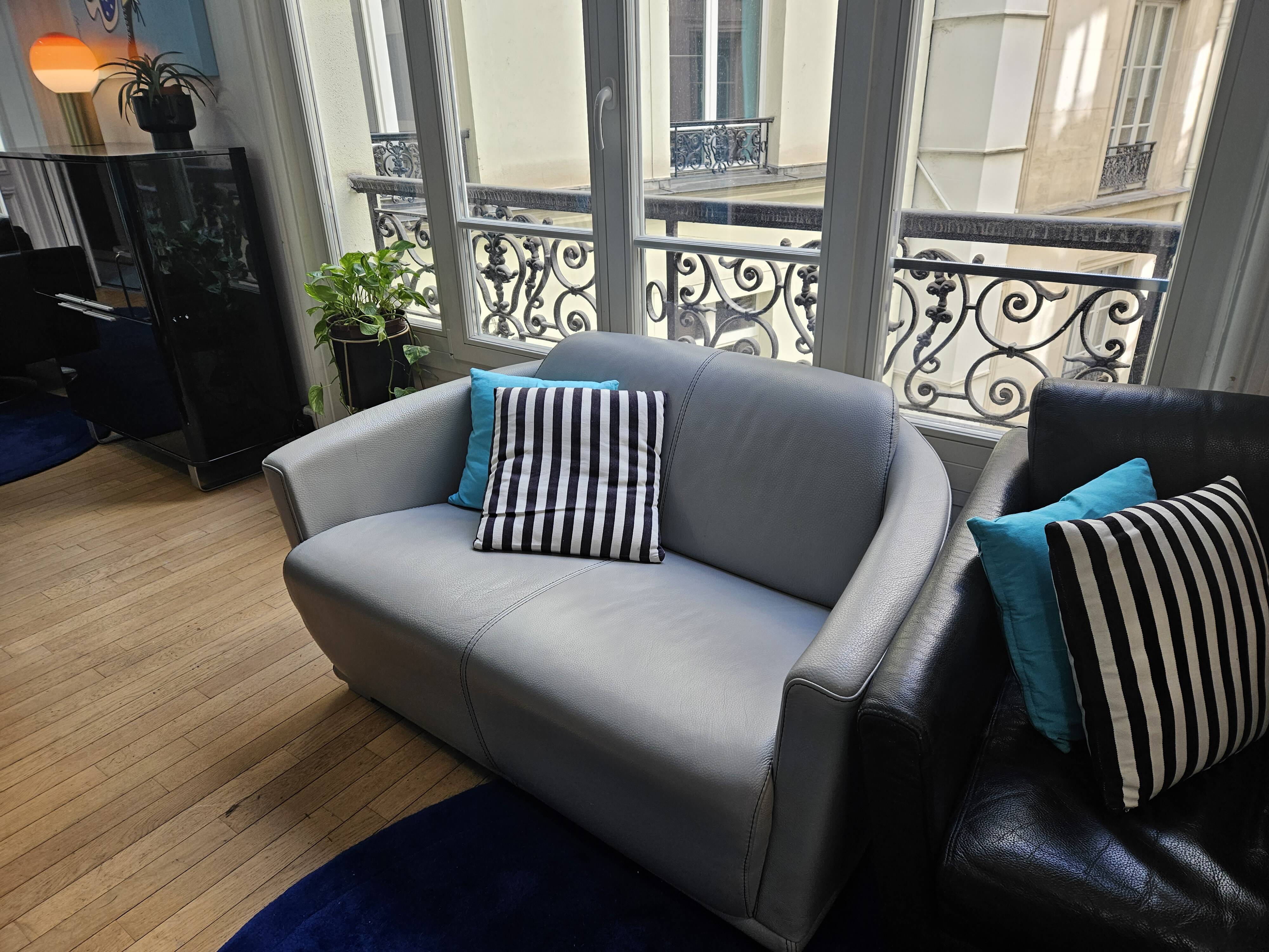 3-seater sofa, 2-seater sofa and an armchair in grey leather by Calia Italia.