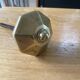 Octagonal brass door handle