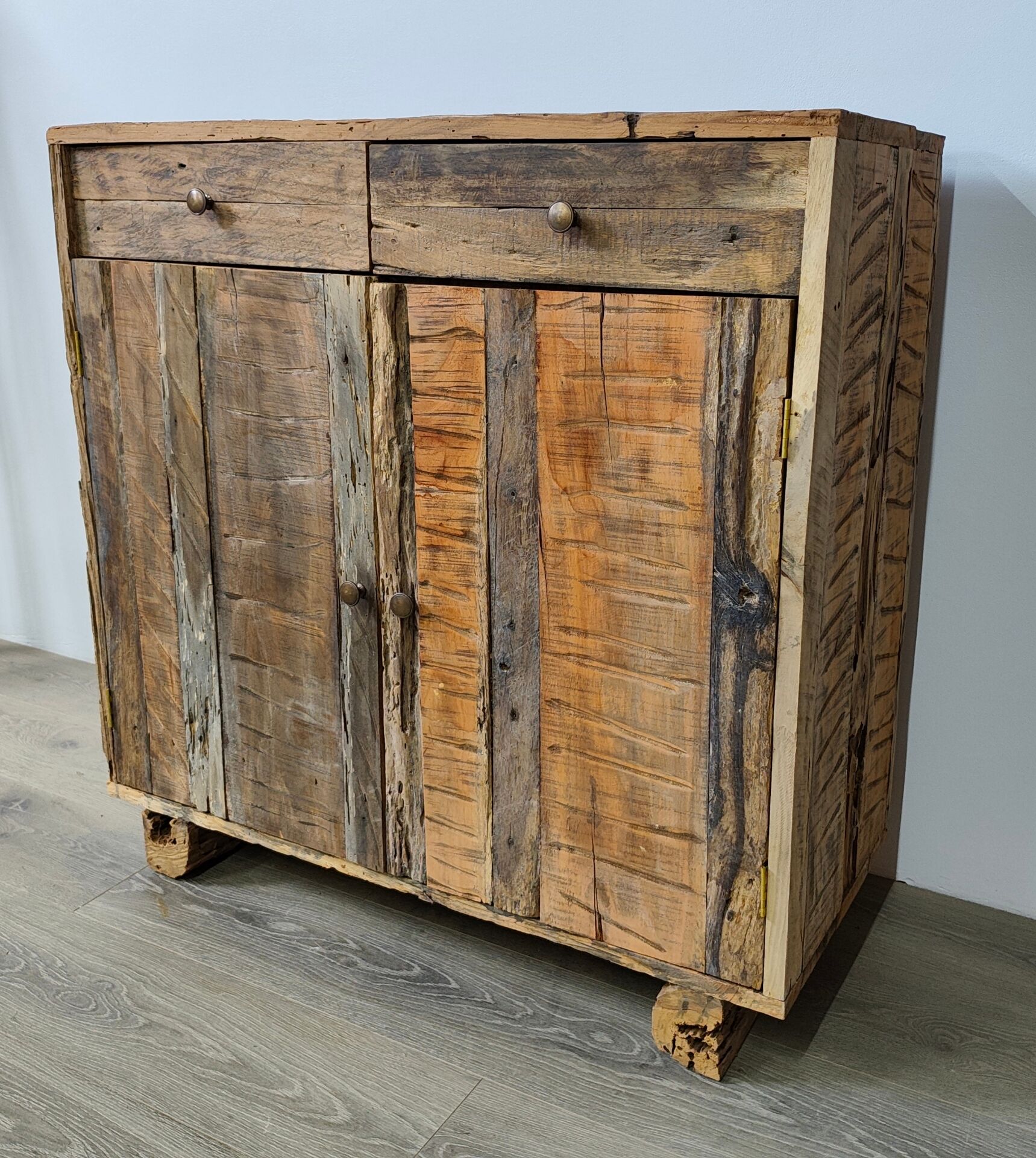 Two-door buffet with two drawers in antique wood.