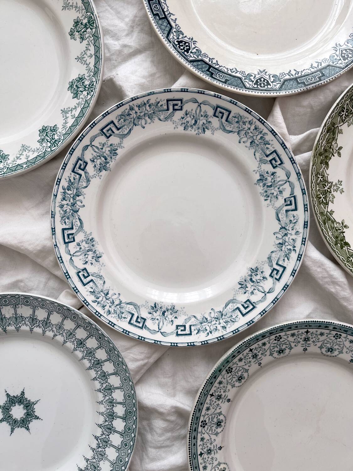 6 mismatched Saint Amand ironstone flat plates