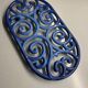 Old cast iron table mat