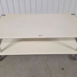 Vintage steel coffee table from the 1970s on wheels.