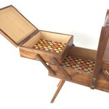 Worker on wooden compass feet