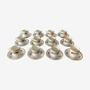 Service of 12 porcelain coffee cups, Raynaud, Limoges, 1950s.