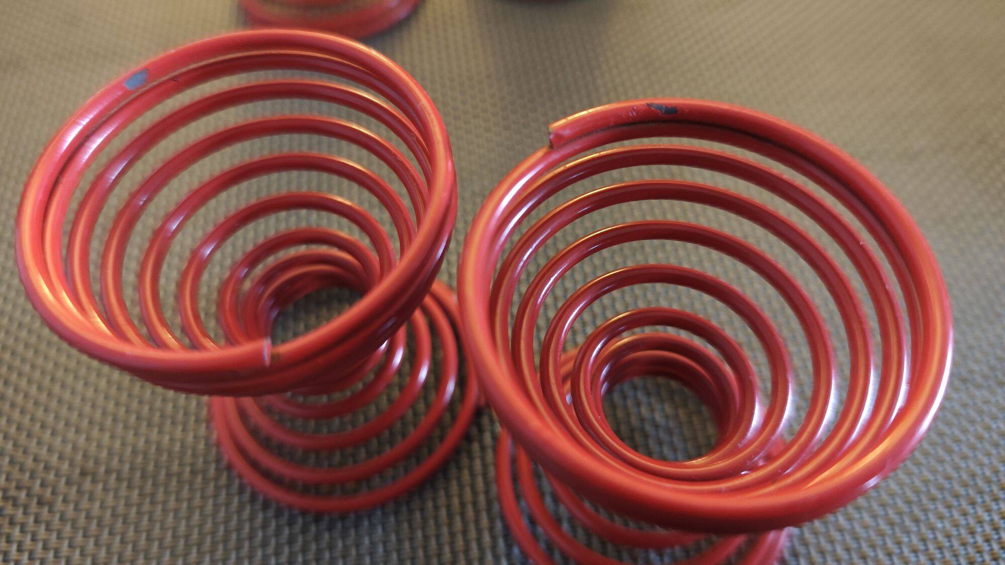 Set of 4 red lacquered spring egg cups - 1980s