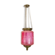 Antique pendant of pink opaline glass with brass edge and suspension from around 1860