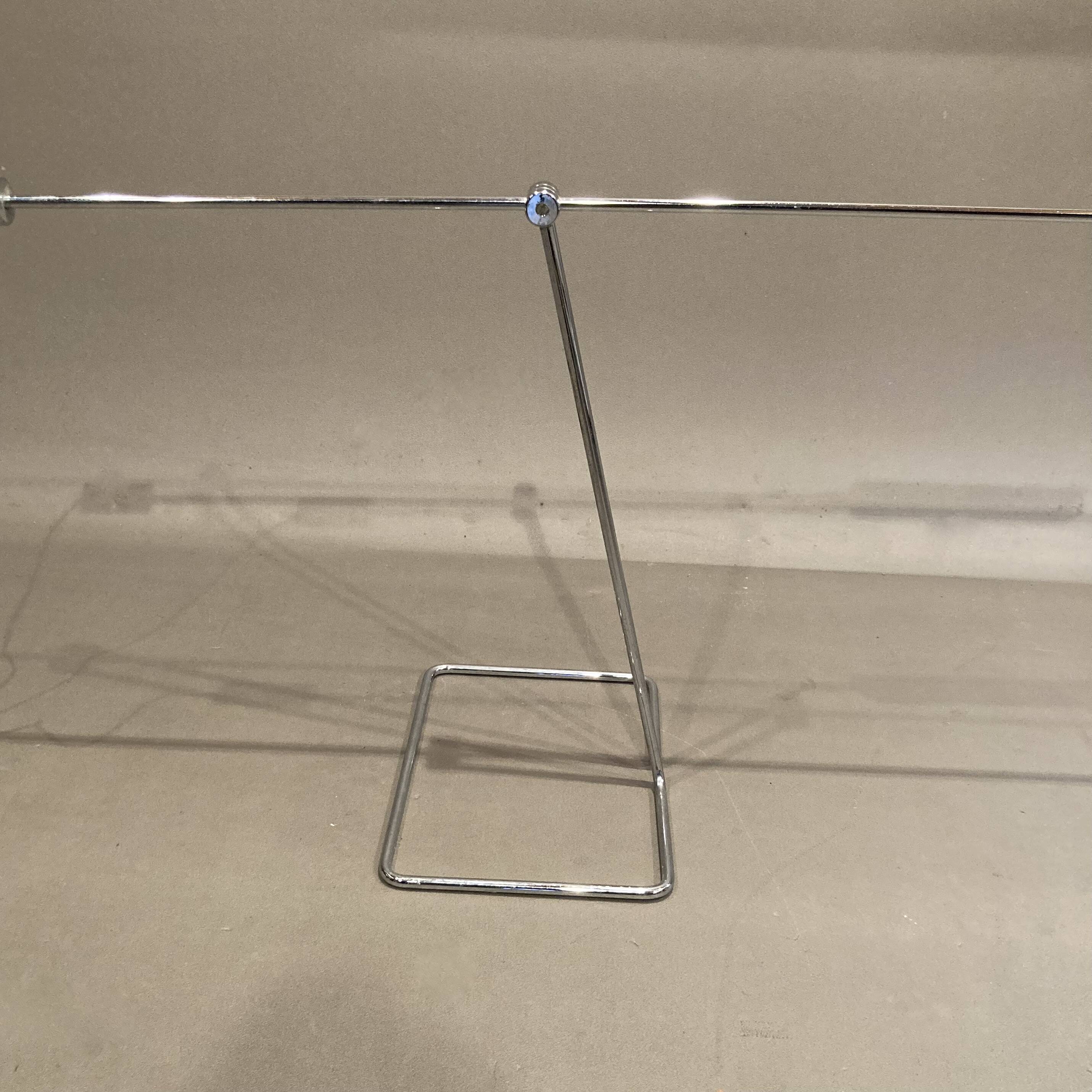 Large modular chrome lamp.