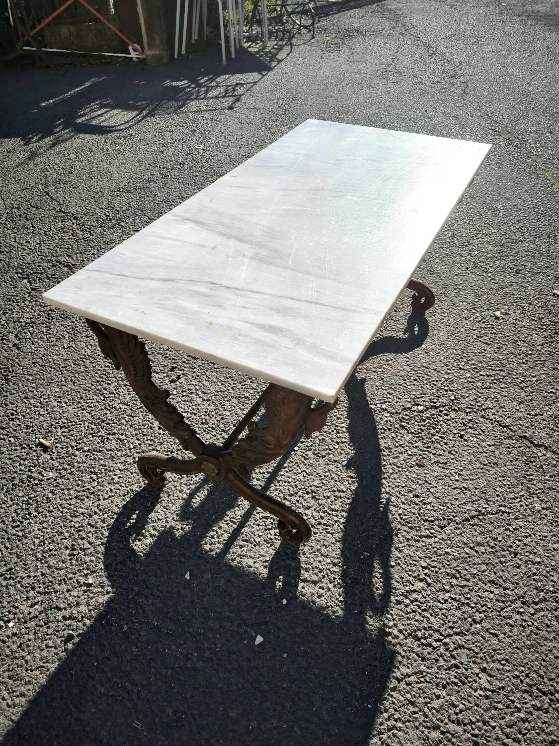 Cast iron and marble swan-neck coffee table