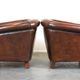 Set of two rugged sheep let of two rugged sheep leather club armchairs with a nice distressed look