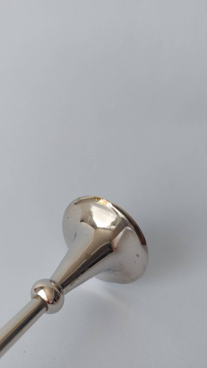 Silver metal candlestick holder