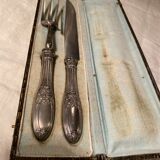 Fork and leg knife in a box