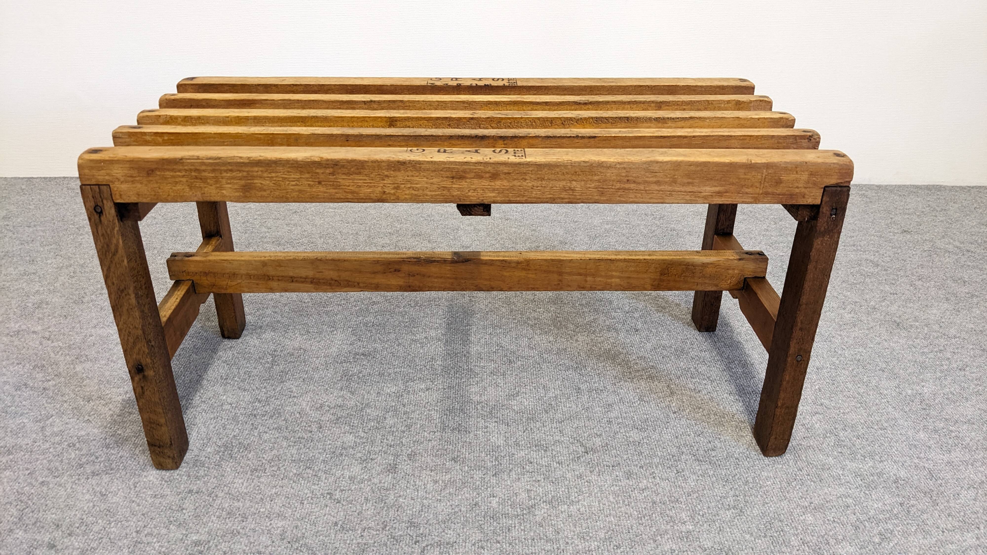 Wooden slatted display bench or support, France circa 1960.