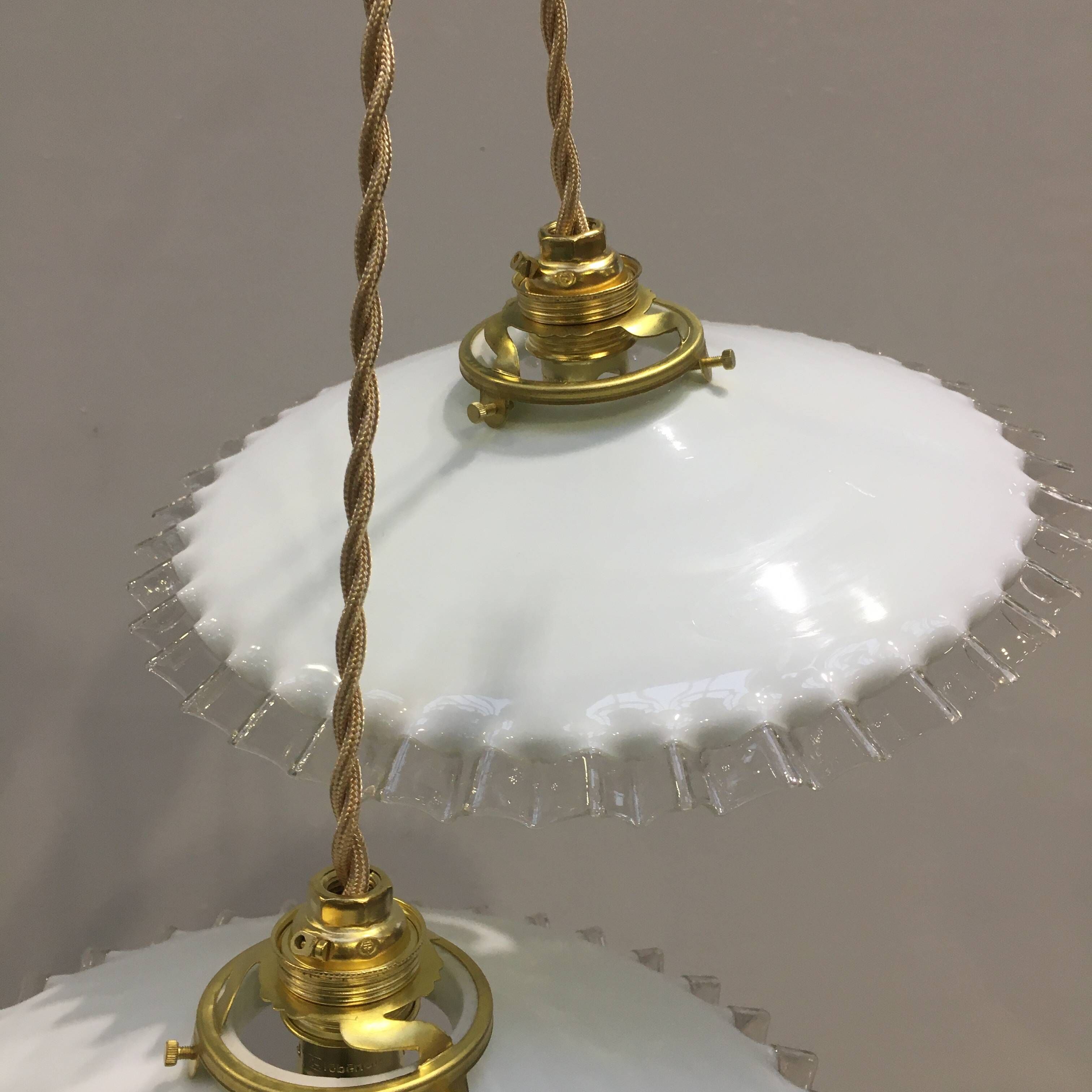 Pair of vintage pendant lights in white opaline and transparent serrated edges