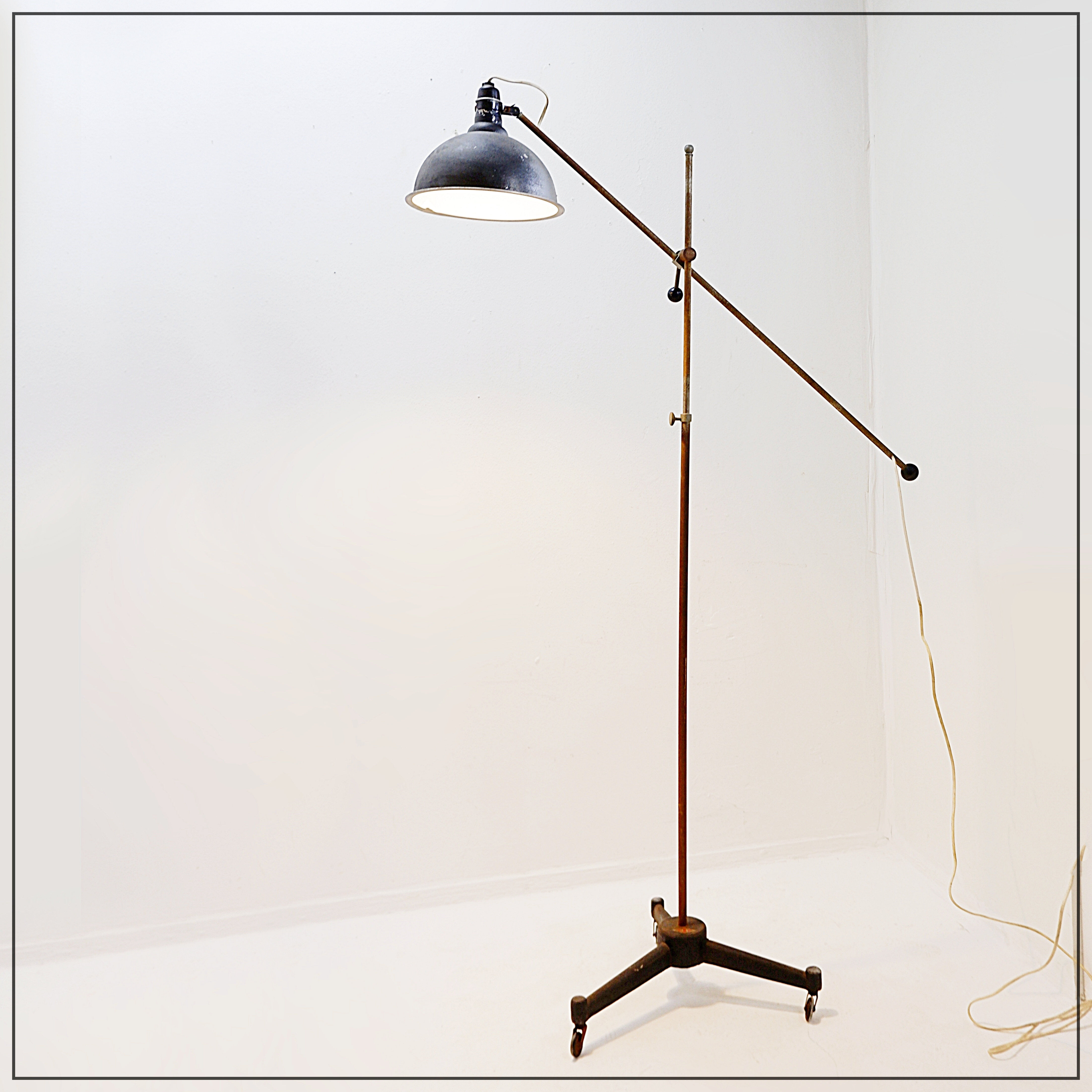 Industrial articulated floor lamp