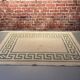 White and green rectangular rug