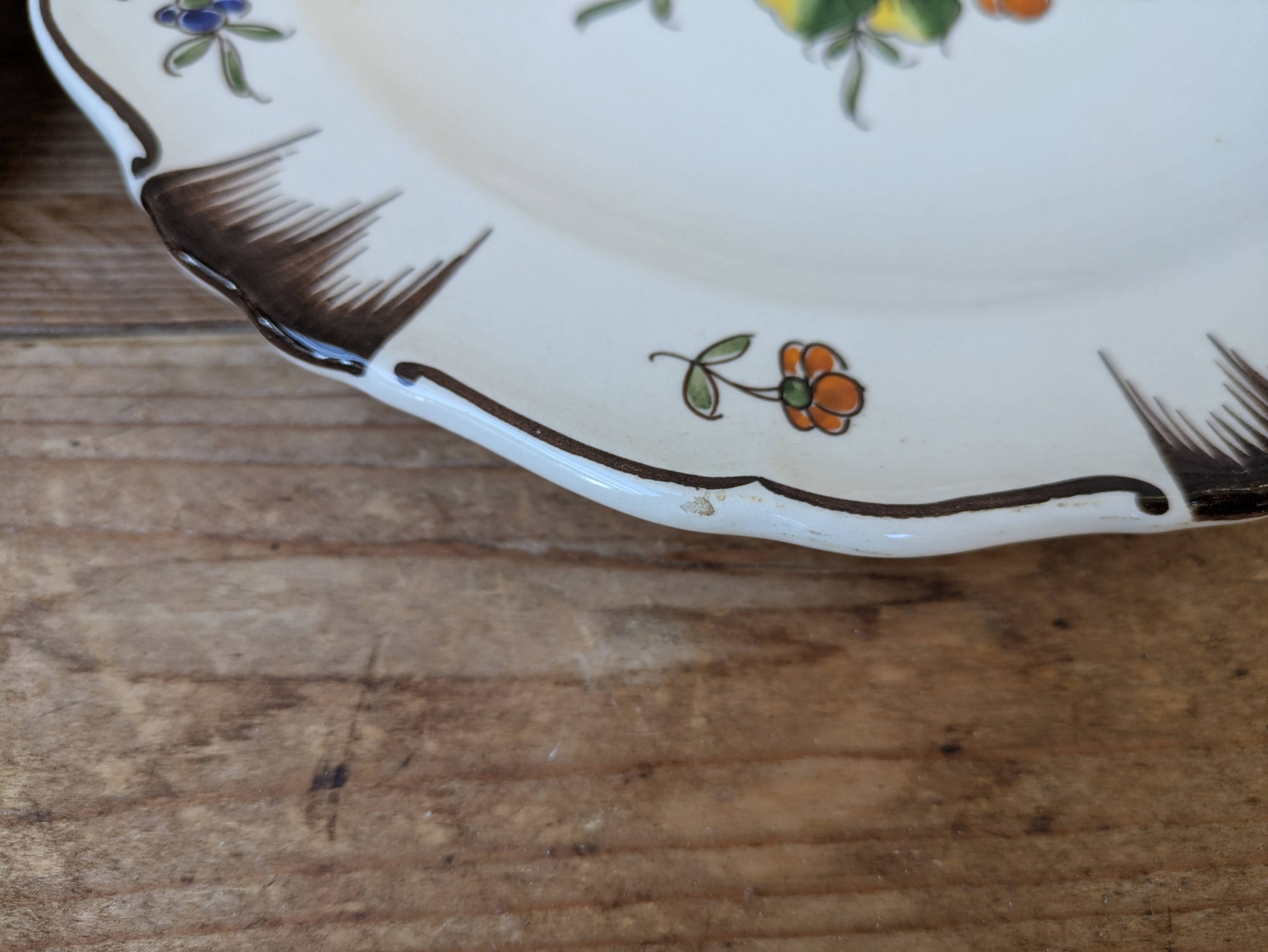 Set of 2 antique hand painted floral pattern plates