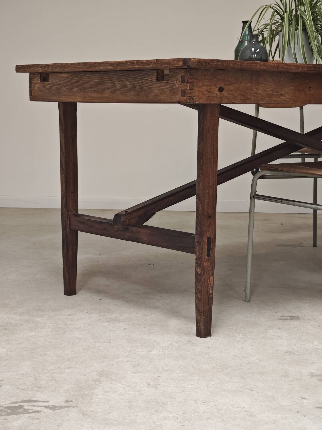 Vintage workshop folding table in oak with a hand-patinated black top.