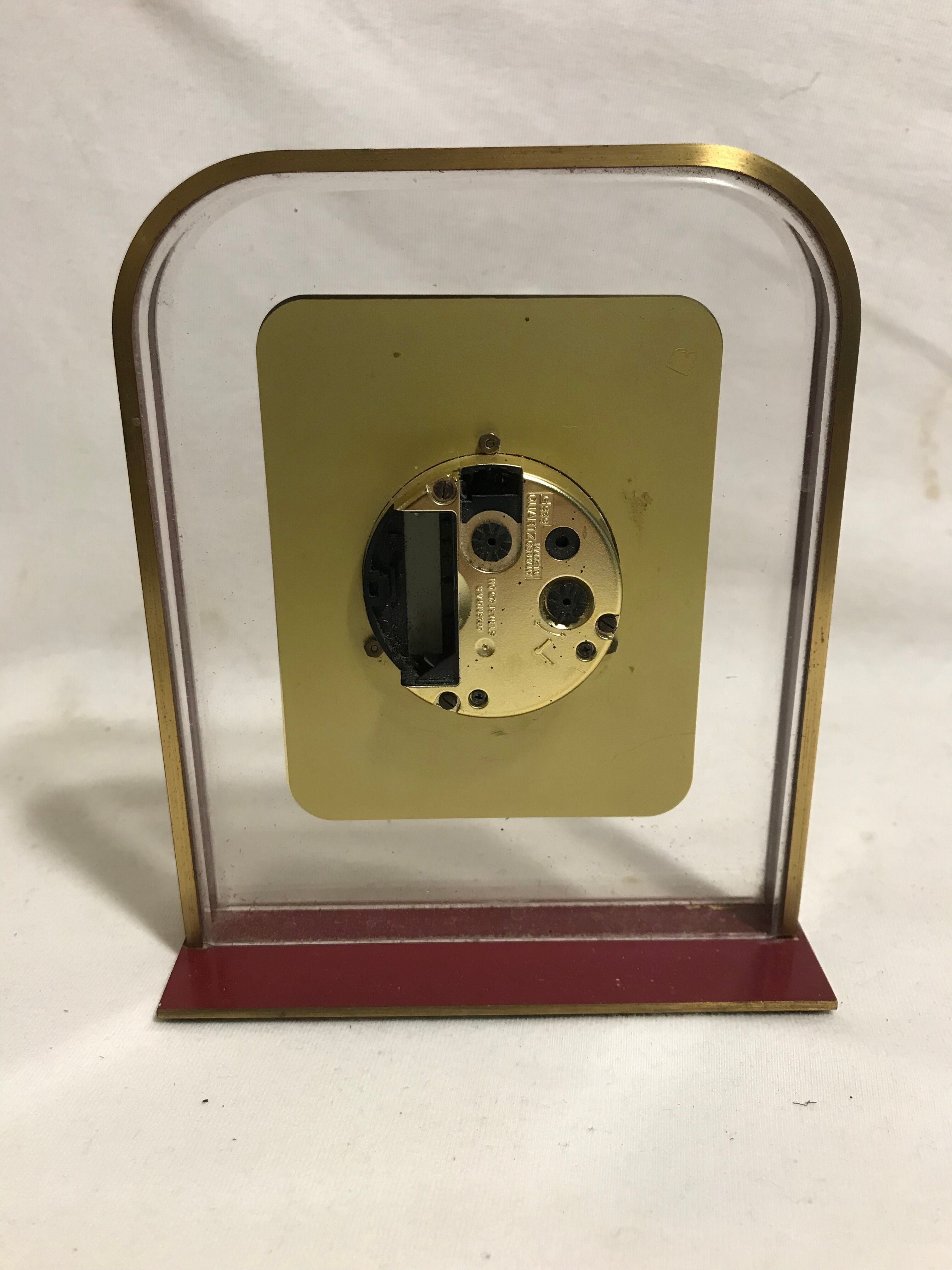 Clock pendulum table featured years 70 vintage